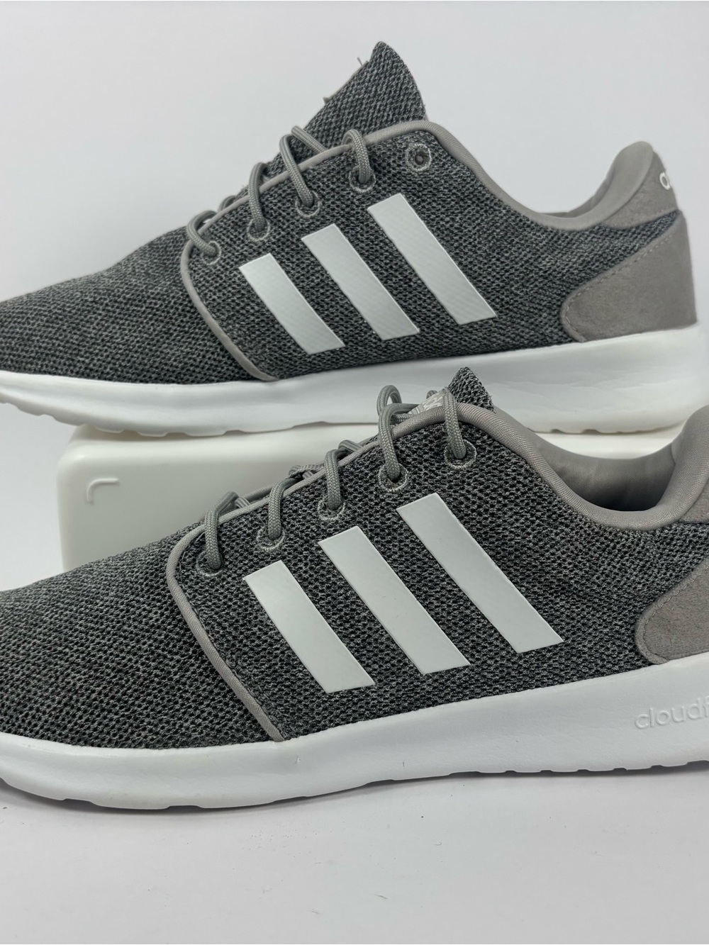 adidas Womenโs Grey and White Knit Sneakers